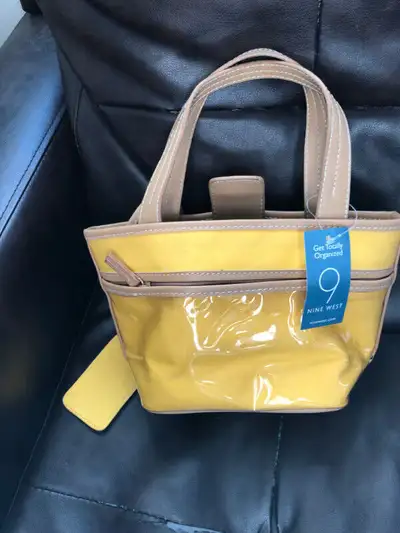 270 Brand New Nine West “Wallet on a String” $15.00, View more