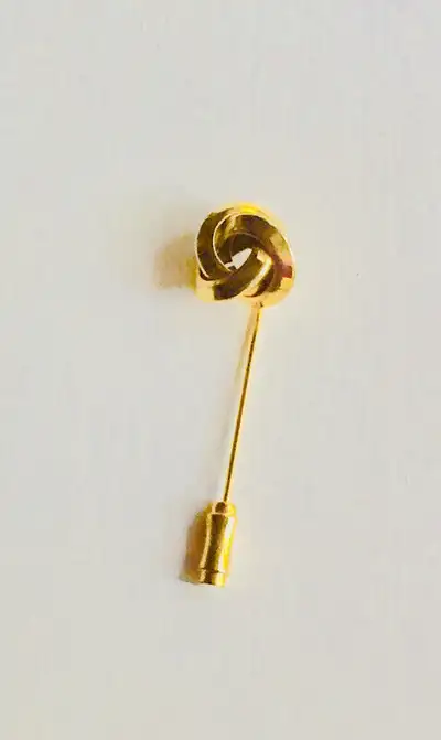 As described. No ad space left for me to post in jewelry so here it is. Approx. 2 inches long. Gold...
