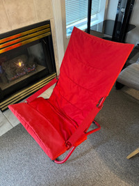 Mesh folding chair with cover.