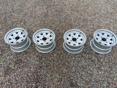 4 wheels are 12 x 7 4 holes on 110mm All four have offset for independent suspension Will fit most H...
