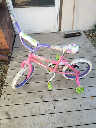 Pink Huffy Bike“Sea Star” with training wheels, View more