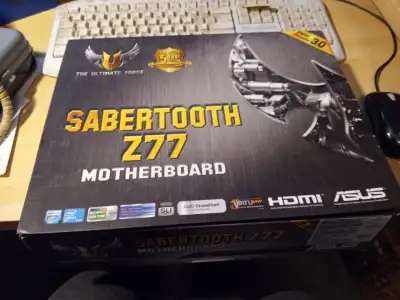 Sabretooth Z77 board in fully tested and ready condition with Intel i5-3570K processor, NH-Li low pr...