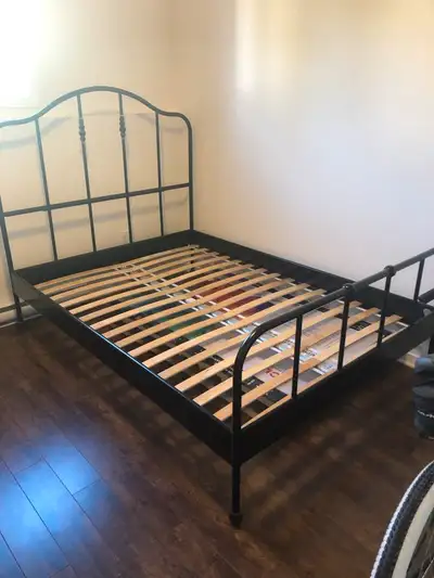 Twin/Double bed frame. Recently got a queen size mattress so longer have use for it. It is currently...
