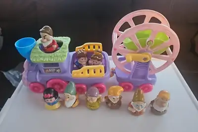 Train and ferris wheel and little people. $25 obo