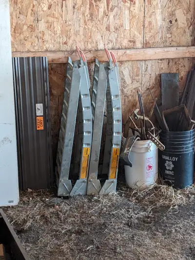 Prime quad loading ramps. Open up to 9'. They work well but stopped using them when I sold my truck...
