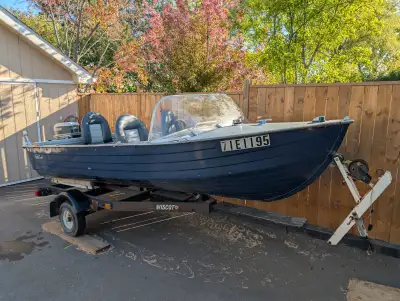 Aluminum Fishing boat. Hull is 1981 13’7” Mirro Craft, Motor 1985 30HP Evinrude, 2 stroke, electric...