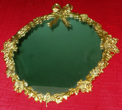 ANTIQUE HEAVY METAL DECORATIVE MIRROR $100, View more
