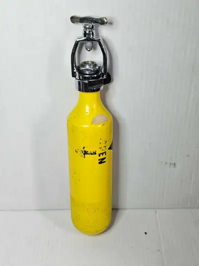 Vintage 1971 Nemrod Scuba Pony Bottle This is a vintage yellow Nemrod "pony" or emergency air bottle...