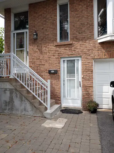 Beautiful, bright 1 bedroom legal street level walk-in, split level basement apartment with separate...