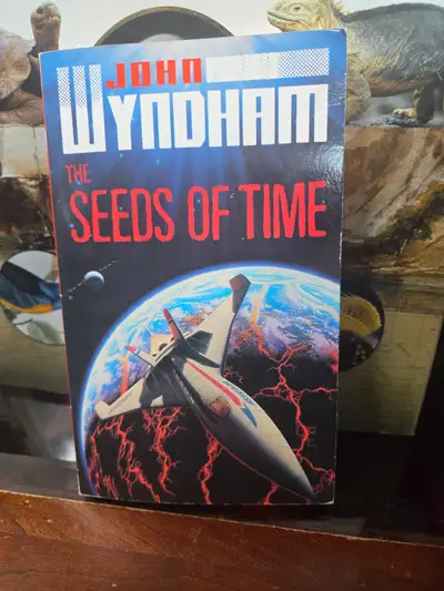 This is a pre-owned copy of the classic science fiction novel The Seeds of Time by John Wyndham, fea...