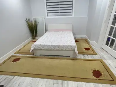 This carpet is made in Türkiye. It is woven using a three-pile system with a density of 940,000 knot...