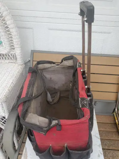 First $40 takes it. I am not looking for any offers. For sale a used Husky Rolling Tool Bag With Exp...
