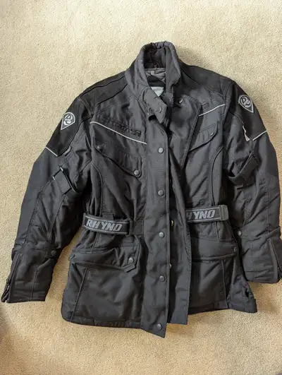 Ladies Rhyno brand jacket size large with a removable lining. It's been worn only a few times and is...