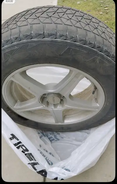 Winter tires with rims still have a life Size 235 /65 R18 Used it from my Nissan pathfinder Pick up...