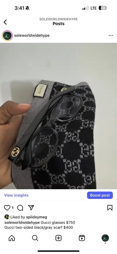 Gucci two-sided black/gray scarf $400, View more