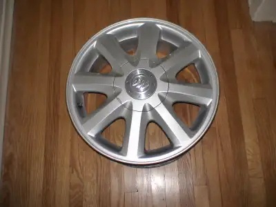 I have a excellent set of Buick Allure aluminum rims including center caps