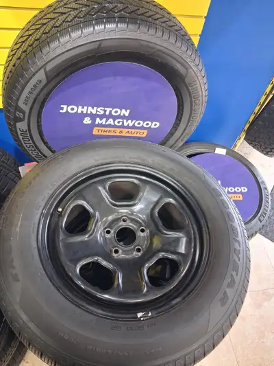 255/60R18 GOODYEAR EAGLES WITH STEEL FORD RIMS OE MOUNTED AND BALANACED READY $700 CASH N CARRY