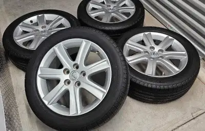 Set of 4 Lexus ES original rims with All Season Tires good condition the tires has lots of treads ri...
