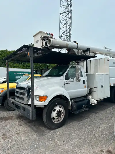 2012 Ford F750 - Altec LRV56 boom - 99,000 miles - working height 61ft - chip/dump box Call or text...