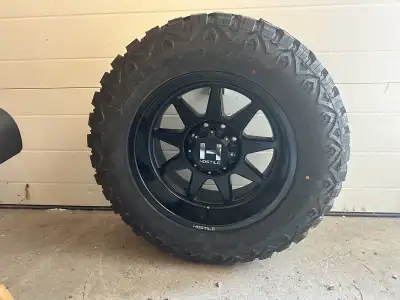 Brand new never used 20x10 Black Hostile Omega H121 rims mounted and balanced on 35x12.50R20LT RBP R...