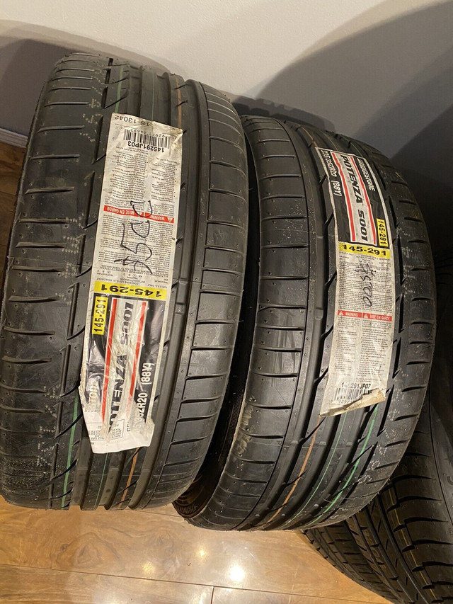 Two new Bridgestone Potenza S001 235/35R20 tires in Tires & Rims in Penticton