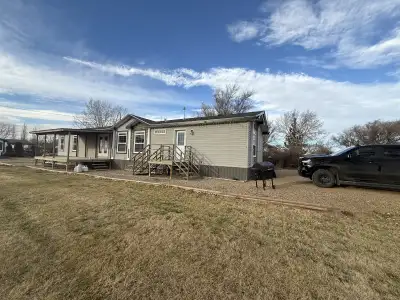 3 bedroom, 2 bath open concept modular house on a double lot in Hazlet, SK for sale. Includes covere...