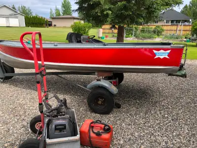 14 foot Thornes Aluminum fishing boat with trailer, spare tire, tie downs. 8 HP Mercury Mariner 2 st...
