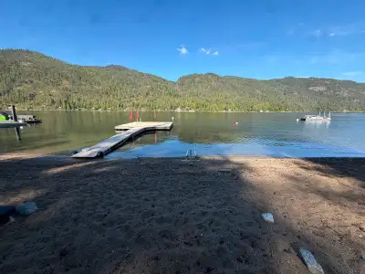 Wake up to sweeping views from this flat 1.55 acre property at Christiana lake with a 155 feet of wa...