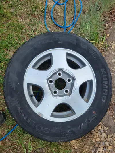2003 Chevrolet Malibu 15" Rims w/tires, Kumho Solice TA11 215/60/R15, including 4 center caps, great...