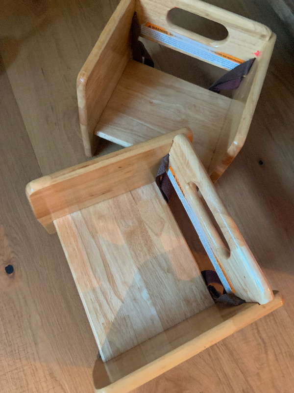 2 solid wooden booster seats in Feeding & High Chairs in Edmonton