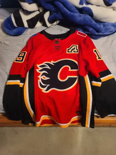 Red Tkachuk-$100 Size 50 White Blank-$60 Size 52 only wore white jersey twice & red jersey like 5 ti...