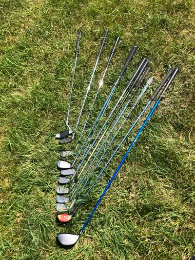 Mixed set of 11 right handed golf clubs in a bag, View more