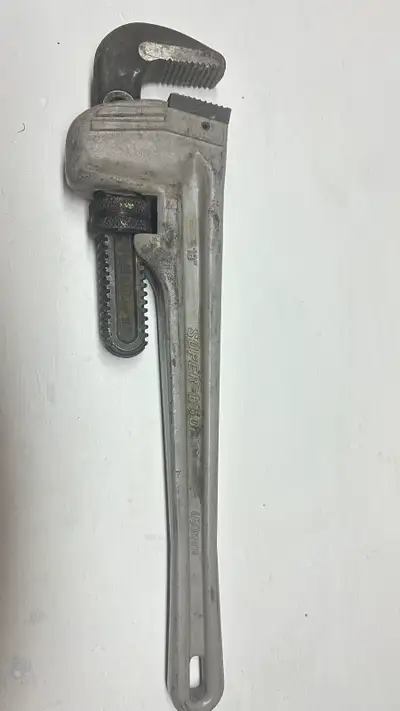 This is a used Super-Ego 18 inch pipe wrench. This tool has been used, but still has life left in it...