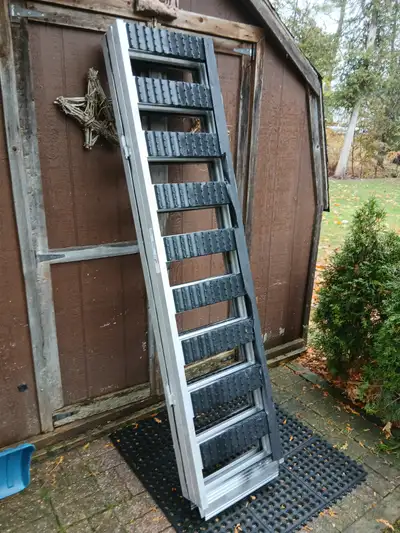 Snowmobile or ATV ramp. Almost new. 1500LB capacity. 54"wide X 77"long. Purchased from Canadian Tire...
