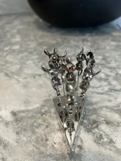 This set contains 8 Pieces silver mouse cheese picks with crystal. Made of silver plated material. A...