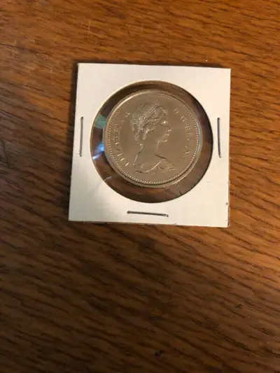 pièce de 1 dollar en nickel 1974 anniversaire de Winnipeg (VCR 13 Spikes) une des 20 variantes (visi...