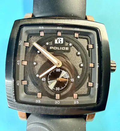Like new POLICE Brand Watch from Italy. Awesome square dial and case design. With subseconds dial an...