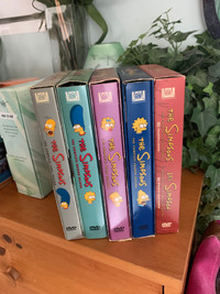 Simpsons dvds.  seasons 1, 2, 3, 4, 5 and 3 extra-1, 1, 5