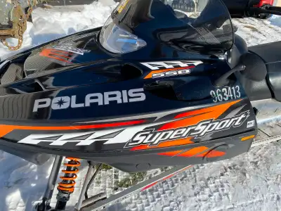 2006 Polaris Super Sport 550 with fan cooled, had heated hand and thumb warmers, has reverse, just l...