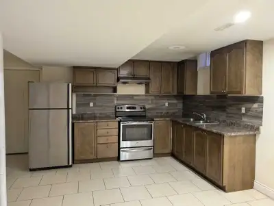 This spacious 2-bedroom basement apartment is located at Castlemore & McVean in Brampton, offering a...