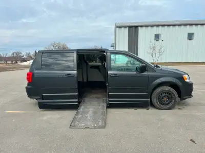 2012 Dodge Grand Caravan with side entry power in-floor ramp conversion from Vantage Mobility. The f...