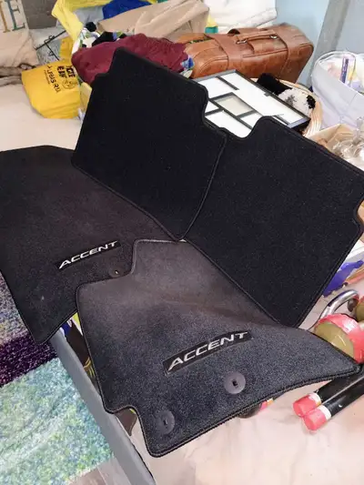 Keep your vehicle interior protected with this set of genuine Hyundai Accent floor mats, which are i...