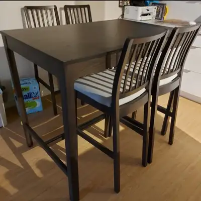 Brown bar table with four chairs, View more