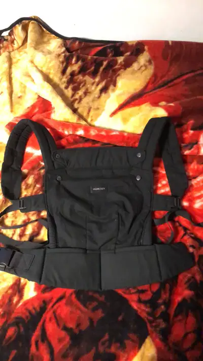 Brand new Momcozy baby carrier., View more