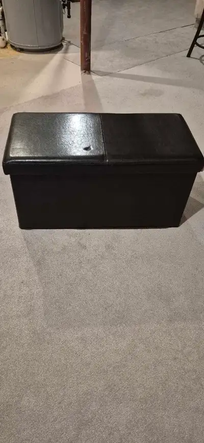 TWO Dark Brown leather storage ottoman bench. This offers a convenient place to sit and store items....