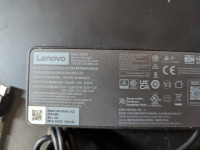 a few Genuine Lenovo AC Power Adapters