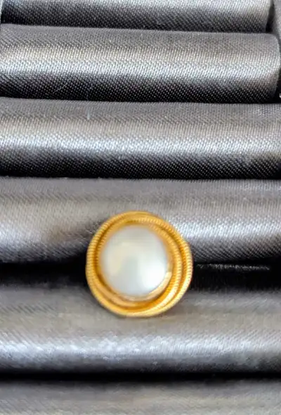 pearl gold earring lost in NE calgary, View more
