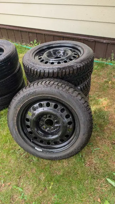 For sale is a set of four Hankook WinterPike RS winter tires mounted on steel rims, sized at 195/65R...