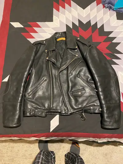 Heavy Leather Motorcycle Jacket XL in size Made with thick leather Quilted lining Willing to trade f...