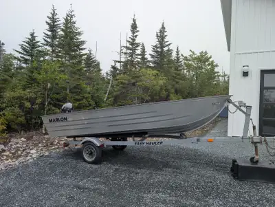 Boat, motor and trailer package in excellent condition. Marlon SWV14' utility boat boasts an all-wel...